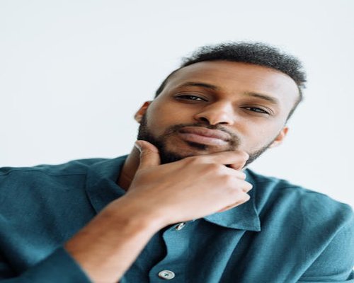 Face of a serious man looking calm